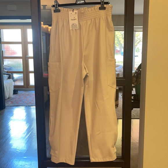 NWT cream faux leather cargo pants. elastic waist & silver button details. - Picture 3 of 5